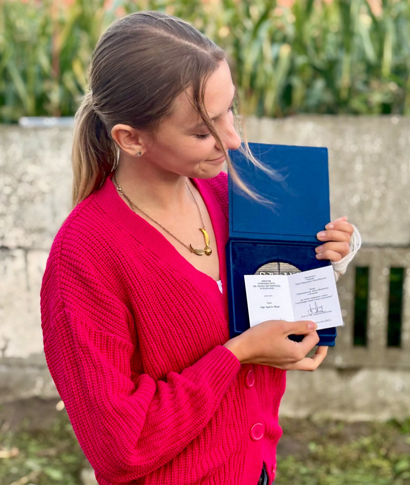 Mgr Agata Mania z Medalem UAM