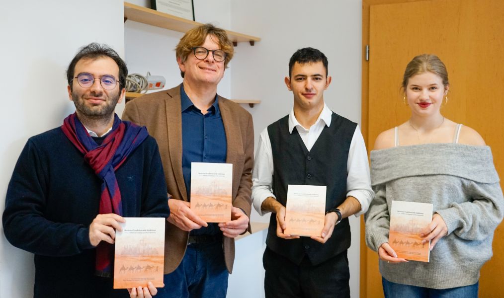 Book Between Tradition and Ambition'